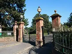 Western entrance gate, listed as Grade II with the lodge