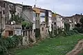 The dry bed of the river Daró in the town centre.