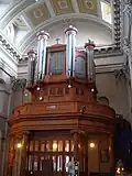 The organ above the entrance doors