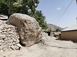 Street with large rock
