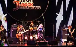 Sug performing in Bangkok in 2010