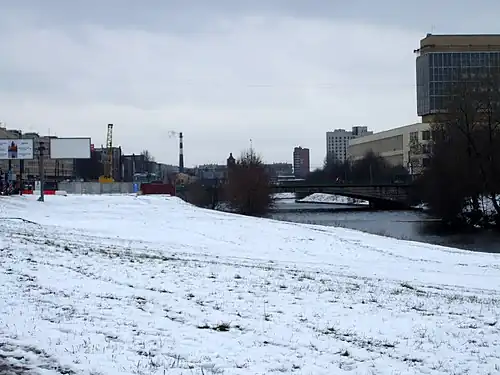 View from the Sverdlovsk embankment of the Neva River to the Bolshaya Okhta River and Komarovsky Bridge. March 23, 2008
