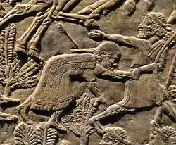 Teumman wounded and led by his son Tammaritu, trying to escape from the battlefield at Ulai.[6]