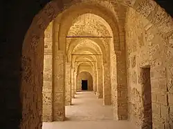 One of the ground-floor galleries around the courtyard