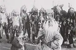 The last Great Khüree Cham- dance festival in Mongolia before organised Buddhism was wiped out, the festival was organised in 1937. The central figure in the photo is the deity of the Old White Man, the most comic character in the cham.