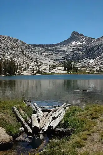 The start of Budd Creek, Yosemite, on Budd Lake, Cockscomb in the background
