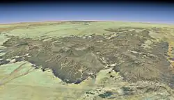Satellite overview of the Tibesti Massif. Trou au Natron is located to the left; it is highlighted in the full-size view of the image.