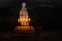 Rare marble Buddhist Avalokitesvara statue, from the Koryo (Goryeo) Dynasty - in situ in a cave near Kwaneum-sa (Kwaneum [Guanyin] Temple), Kaesong, North Korea.