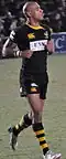 Rugby player with wrist brace