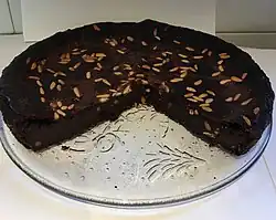 Chocolate torta paesana with raisins and pine nuts