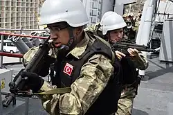 Turkish boarding teams practice tactical movements aboard TCG Gökçeada (F-494) during exercise Phoenix Express 2017.