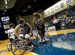 Wheelchair basketball player takes a shot