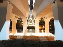 A view of the new bridge from directly underneath it, looking across the river