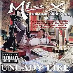 The cover features Mia X inside a lavish room with a No Limit poster and a gold chandelier, sitting on a brown leather chair with her white heels atop a brown office desk. The desk features a green creature statue, a money counting machine, a lamp and wrapped up $100 bills. Both the artist's name and the album title appear above and below Mia X, colored in white.
