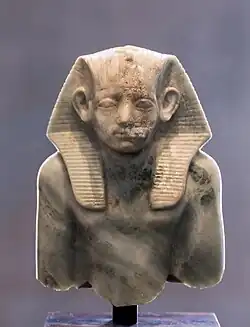 Upper part of portrait statuette of pharaoh Amenemhat III, wearing a nemes, c. 1853 – c. 1805 BCE