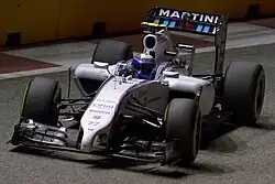 Valtteri Bottas driving the Martini-sponsored the Williams FW36 at the 2014 Singapore Grand Prix.