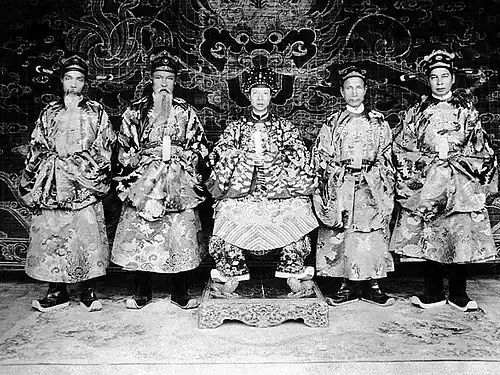 Nguyễn Hữu Bài in royal costume (second) from right