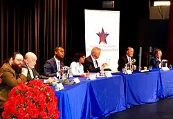 From left to right: Steve Seuferer, Andrew Wildman, Marcellus Crews, Angela Alsobrooks, David Trone, Robert Houton, and Brian Frydenborg