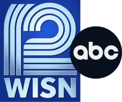 In a dark blue box, a numeral "12" appears, with both numbers rendered in three thick striped lines placed close together; the "1" is curved to the right towards the top, while the "2" is rendered using three horizontal straight lines on the bottom, and three curved lines nearly circular and then flattening against the bottom element for the top which do not meet. Below the numeral, the station's call letters, "WISN" appear. Next to the logo on the right, the blue version of ABC's 2013 logo is rendered in a subtle gloss.