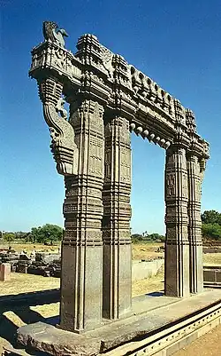 Kakatiya Kala Thoranam (Warangal Gate) built by the Kakatiya dynasty in ruins; one of the many temple complexes destroyed by the Delhi Sultanate.[37]