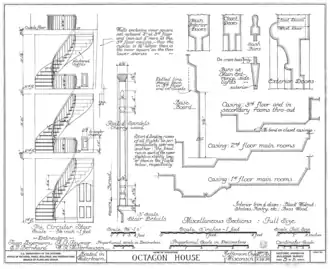 Interior details: the main spiral staircase, door casings and base boards.