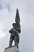 Detail of the standard bearer at the top