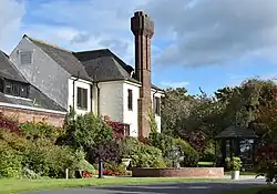 Western House, Ayr. An Arts and Crafts house designed and built by architect Harold Ogle Tarbolton (1919–25) for David Shaw, racecourse manager, and the Western Club. Owned by Ayr racecourse and operates as a hotel. Listed building LB47172.