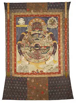 A traditional Tibetan thangka showing the bhavachakra. This thangka was made in Eastern Tibet and is currently housed in the Birmingham Museum of Art.