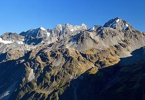 Southeast aspect of Mount Whitcombe centred on skyline with Lauper Peak in upper right corner.