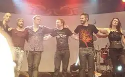 Within Temptation touring line-up between 2011 and 2024. From left to right: van Veen, Jolie, Spierenburg, Coolen, Helleblad, den Adel