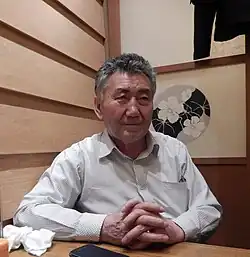 Man seated in a Japanese restaurant