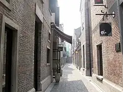 A longtang (弄堂) between shikumen (石库门) townhouses in Shanghai