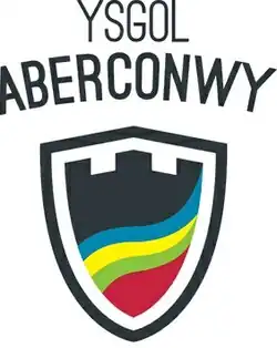 Shield shaped motif with castellations