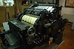Photograph of a printing press.