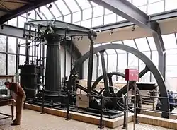Colour photogrpah of a nineteenth century steam engine in the Berlin Museum of Technology.