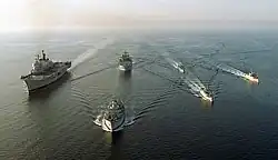 Six late-Twentieth century Royal Navy ships steaming in formation at sea