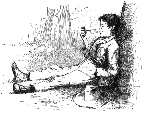 boy sitting under a tree smoking a pipe