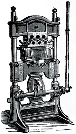 Cross-hatched illustration of a blocking machine.