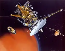 A gold and white satellite with dish pointed to the bottom-right and the disc-shaped Huygens probe slightly apart from it; against the background of the orange globe of Titan with Saturn in the distance.