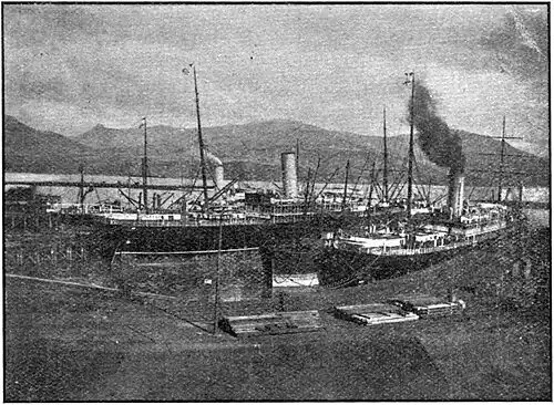 Two ships 'parked' into a harbour.