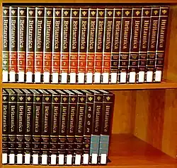 Colour photograph of the Encyclopaedia Britannica on two book shelves