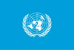 The flag of the United Nations: A white map of the world encircled in a white laurel wreath on a light blue field