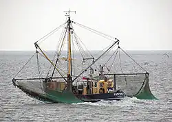 Photograph of a crab fishing vessel at sea