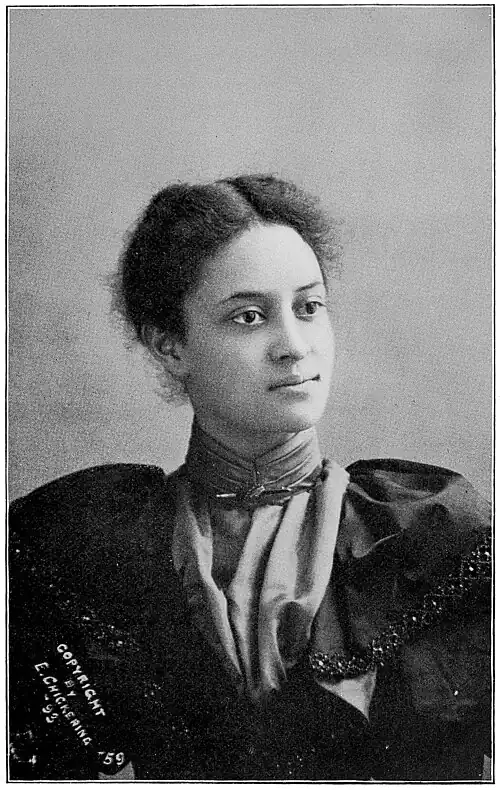 A woman wearing a formal dress