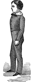 Figure of a boy with an upright posture