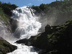 Colour photograph of the Kjosfossen waterfall in Norway.