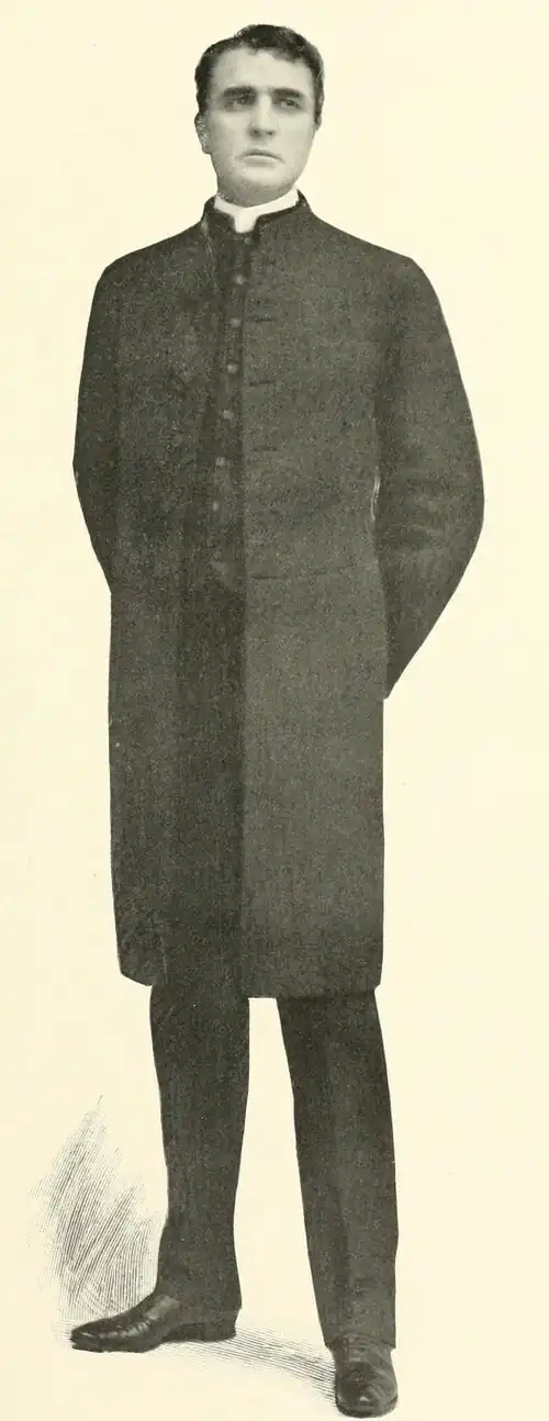 William Gillette as Sherlock Holmes, standing, wearing [describe clothes].